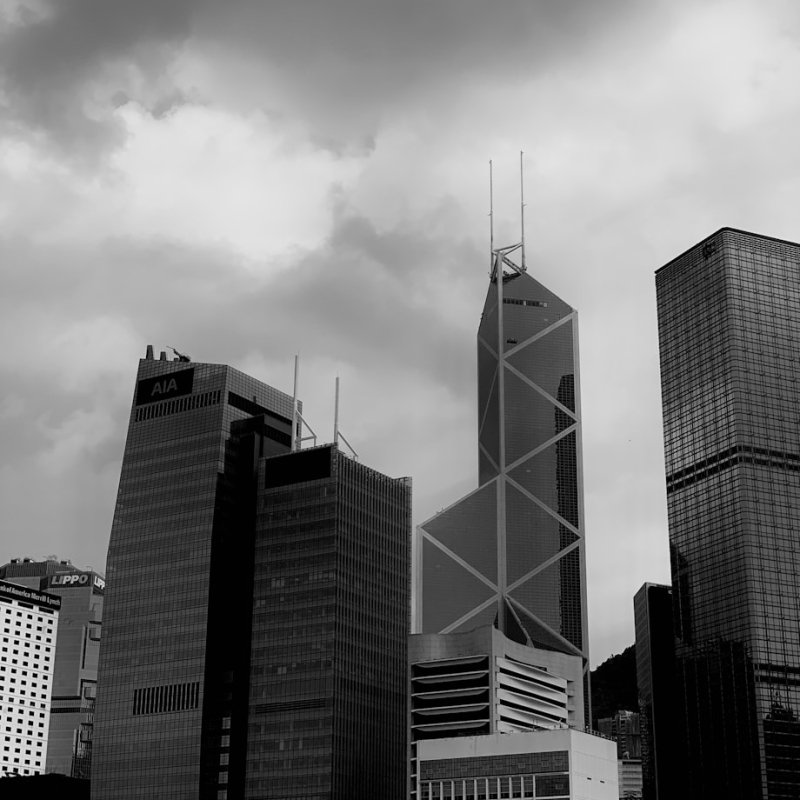 grey clouds over city buildings